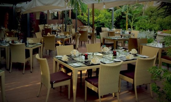 Tables and chairs set up in Bacchus's Secret Garden